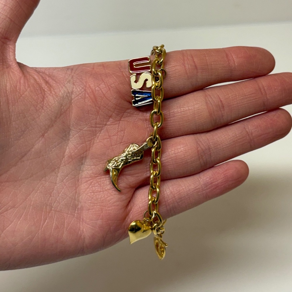 Gold Tone Americana Charm Bracelet USA Flag Statue of Liberty Cowboy Boot 7 Inch